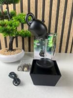 ⁦Fontaine théière flottante décoration de table avec lumières LED et pierres – نافورة مياه على شكل إبريق شاي عائم⁩ - الصورة ⁦8⁩